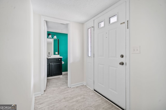 66 Fair Haven Way SE, Smyrna, GA 30080 - unfurnished room featuring baseboards, ceiling fan, a textured ceiling, and wood finished floors