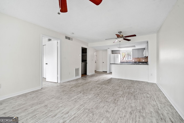 66 Fair Haven Way SE, Smyrna, GA 30080 - bathroom with visible vents, wood finished floors, vanity, toilet, and shower / bathtub combination