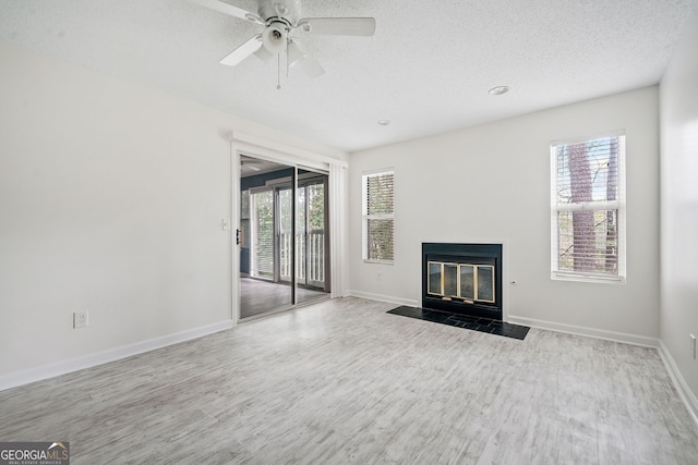 66 Fair Haven Way SE, Smyrna, GA 30080 - unfurnished living room featuring a fireplace with flush hearth, baseboards, and wood finished floors