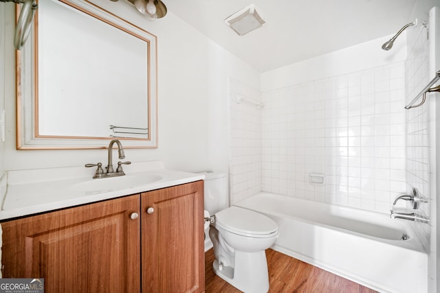 66 Fair Haven Way SE, Smyrna, GA 30080 - bathroom with visible vents, wood finished floors, vanity, toilet, and shower / bathtub combination