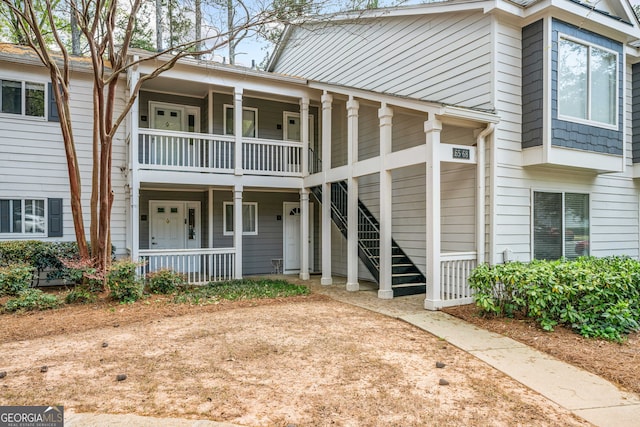 66 Fair Haven Way SE, Smyrna, GA 30080 - kitchen with visible vents, white appliances, light wood-style floors, a textured ceiling, and a sink