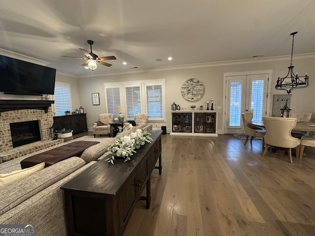 432 Horizon Trl, Canton, GA 30114 - living room with a brick fireplace, wood finished floors, plenty of natural light, ceiling fan, and recessed lighting
