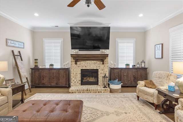 432 Horizon Trl, Canton, GA 30114 - living room featuring wood finished floors, ceiling fan, crown molding, a fireplace, and recessed lighting