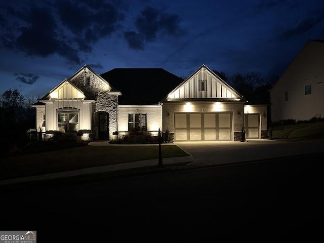 432 Horizon Trl, Canton, GA 30114 - view of front of house featuring board and batten siding, an attached garage, concrete driveway, and stone siding