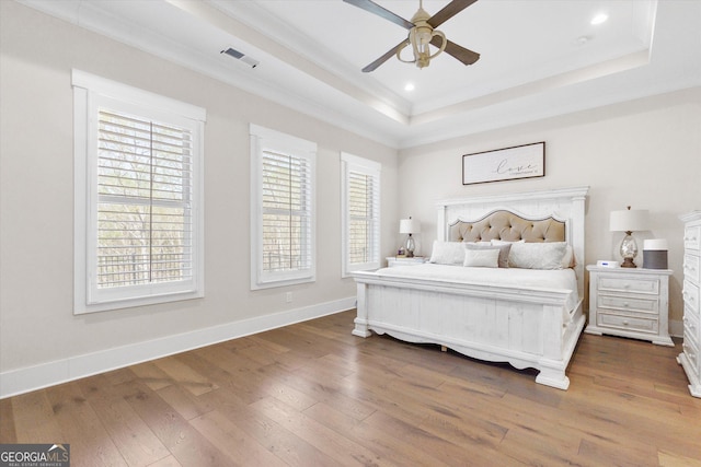 432 Horizon Trl, Canton, GA 30114 - bedroom featuring a raised ceiling, wood finished floors, crown molding, recessed lighting, and baseboards