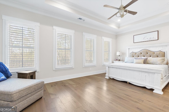 432 Horizon Trl, Canton, GA 30114 - bedroom featuring a raised ceiling, ornamental molding, hardwood / wood-style flooring, multiple windows, and baseboards