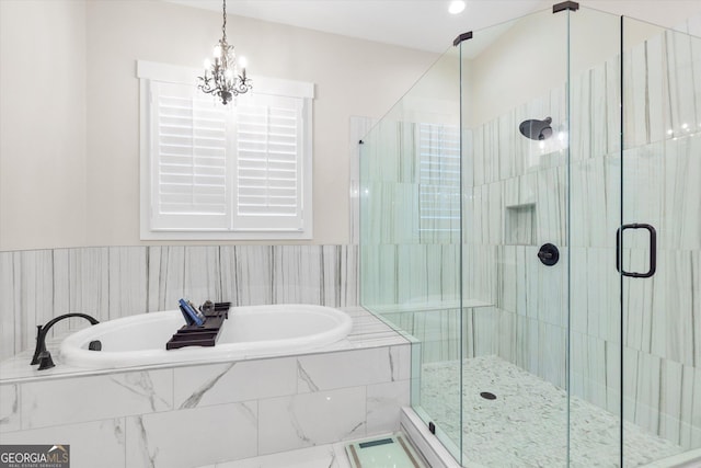 432 Horizon Trl, Canton, GA 30114 - bathroom with a garden tub, a shower stall, and a chandelier