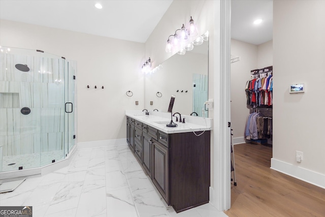 432 Horizon Trl, Canton, GA 30114 - full bath with double vanity, a stall shower, baseboards, a spacious closet, and recessed lighting