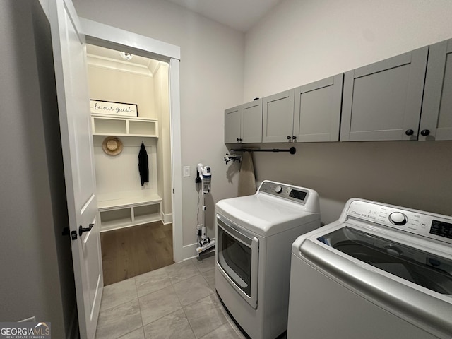 432 Horizon Trl, Canton, GA 30114 - laundry area with cabinet space, independent washer and dryer, baseboards, and light tile patterned flooring