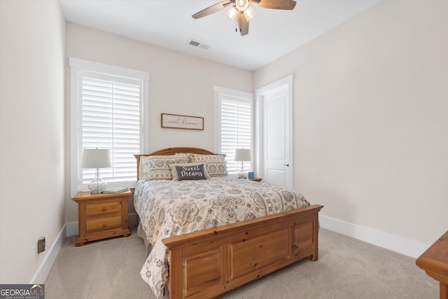 432 Horizon Trl, Canton, GA 30114 - bedroom with light colored carpet, baseboards, and ceiling fan