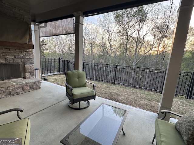 432 Horizon Trl, Canton, GA 30114 - fenced backyard with an outdoor stone fireplace and a patio