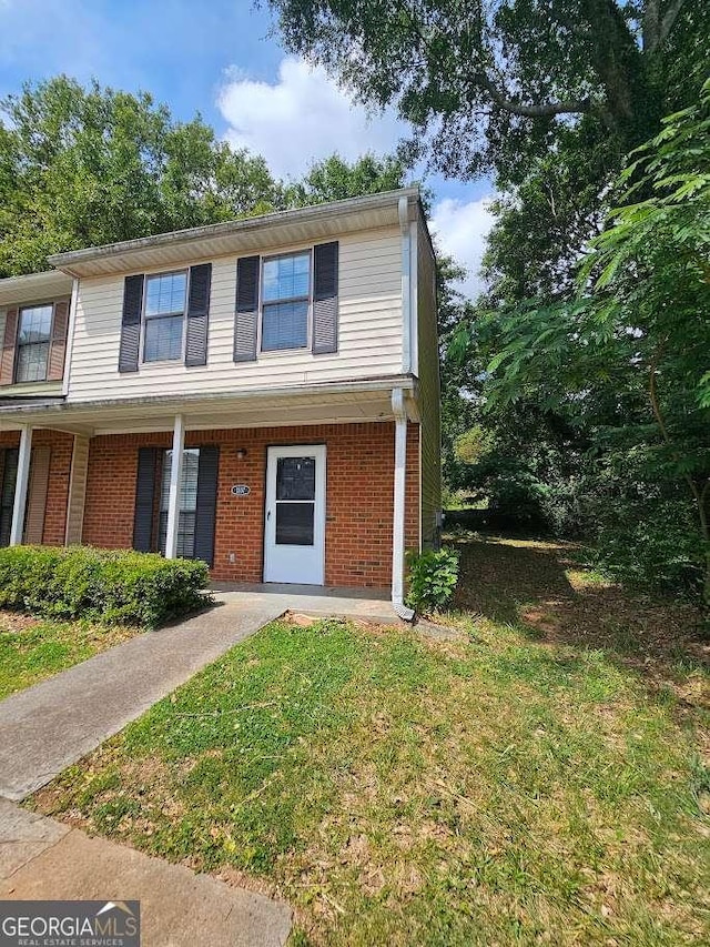 1557 Springleaf Ct SE, Smyrna, GA 30080 - view of front of property with brick siding and a front lawn