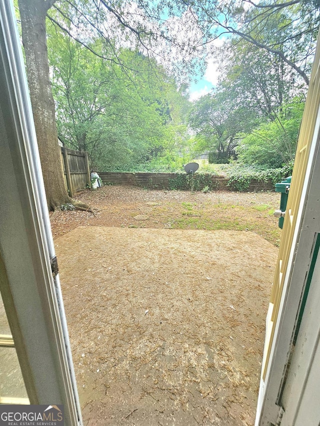 1557 Springleaf Ct SE, Smyrna, GA 30080 - view of yard featuring a patio and a fenced backyard