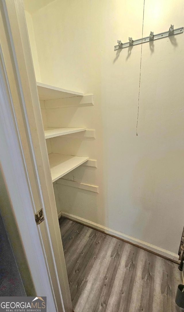 1557 Springleaf Ct SE, Smyrna, GA 30080 - spacious closet featuring wood finished floors