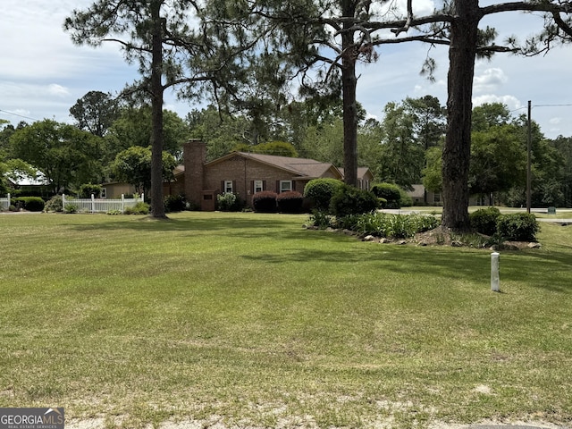 839 Golf Dr, Swainsboro, GA 30401 - view of yard featuring fence