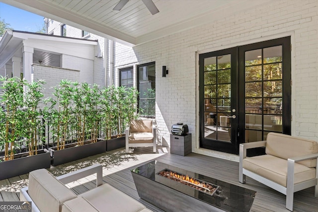 1337 Grey Fox Ct NE Unit 7, Atlanta, GA 30306 - exterior space featuring a ceiling fan, an outdoor living space with a fire pit, and french doors