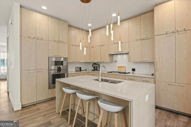 1337 Grey Fox Ct NE Unit 7, Atlanta, GA 30306 - kitchen featuring light brown cabinetry and a sink