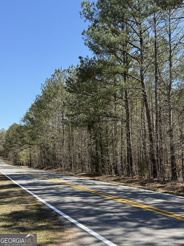 1502 Whooping Creek Church Rd, Carrollton, GA 30117 - view of road featuring a forest view