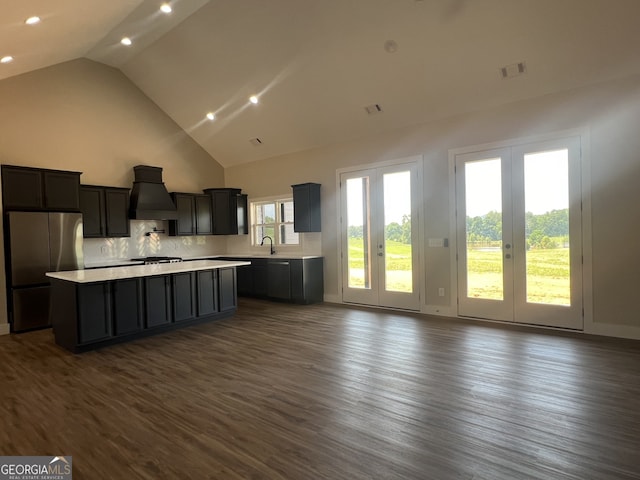 1502 Whooping Creek Church Rd, Carrollton, GA 30117 - kitchen with a kitchen island, visible vents, light countertops, freestanding refrigerator, and custom range hood