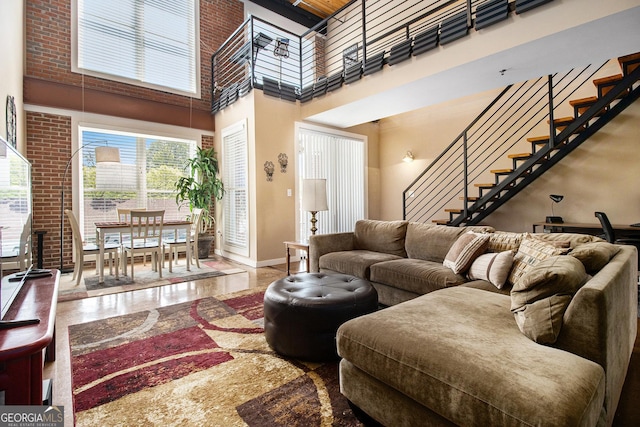 1133 Church Unit 1, Covington, GA 30014 - living area with a high ceiling, stairs, and baseboards