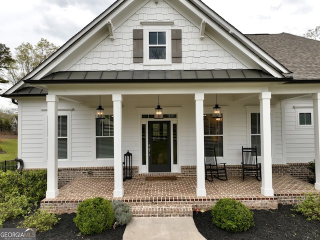 305 Red Gate Ln, Canton, GA 30115 - view of front of property featuring a ceiling fan, covered porch, a standing seam roof, and roof with shingles