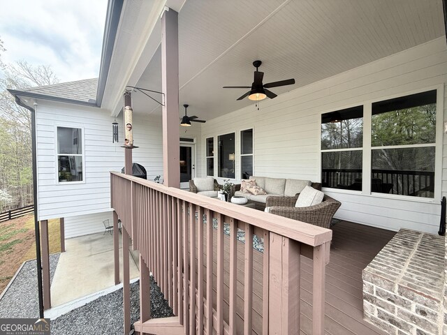 305 Red Gate Ln, Canton, GA 30115 - wooden deck featuring ceiling fan and an outdoor hangout area