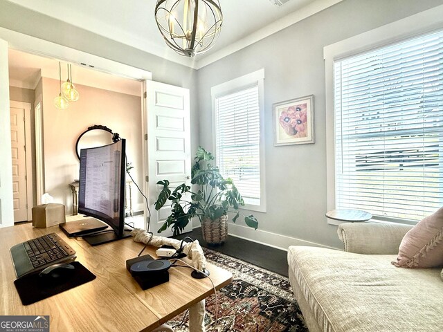 305 Red Gate Ln, Canton, GA 30115 - living room with a notable chandelier, baseboards, and wood finished floors