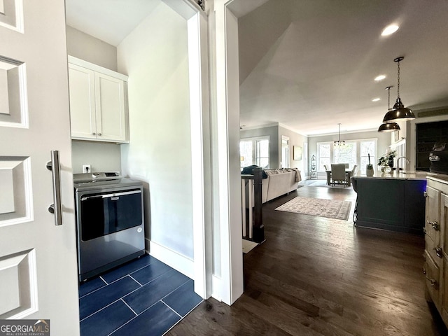 305 Red Gate Ln, Canton, GA 30115 - kitchen featuring recessed lighting, white cabinets, dark wood-type flooring, washer / dryer, and decorative light fixtures