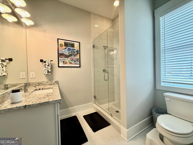 305 Red Gate Ln, Canton, GA 30115 - full bathroom with a shower stall, vanity, baseboards, and toilet
