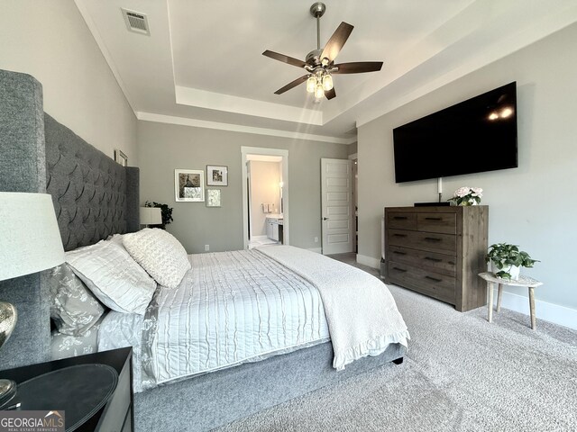 305 Red Gate Ln, Canton, GA 30115 - carpeted bedroom with ensuite bath, a ceiling fan, visible vents, a raised ceiling, and baseboards