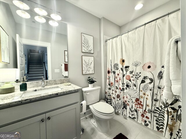 305 Red Gate Ln, Canton, GA 30115 - full bath with tile patterned floors, toilet, curtained shower, and vanity