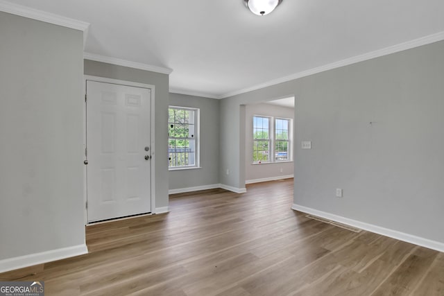 944 Joseph E Boone Blvd NW, Atlanta, GA 30314 - entryway with baseboards, ornamental molding, and wood finished floors