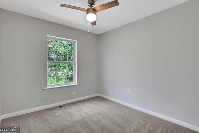 944 Joseph E Boone Blvd NW, Atlanta, GA 30314 - empty room with carpet flooring, visible vents, baseboards, and a ceiling fan