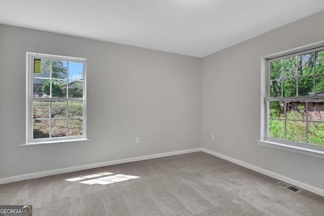 944 Joseph E Boone Blvd NW, Atlanta, GA 30314 - spare room featuring baseboards, visible vents, and carpet floors