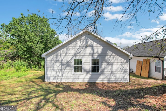 944 Joseph E Boone Blvd NW, Atlanta, GA 30314 - view of property exterior with a yard