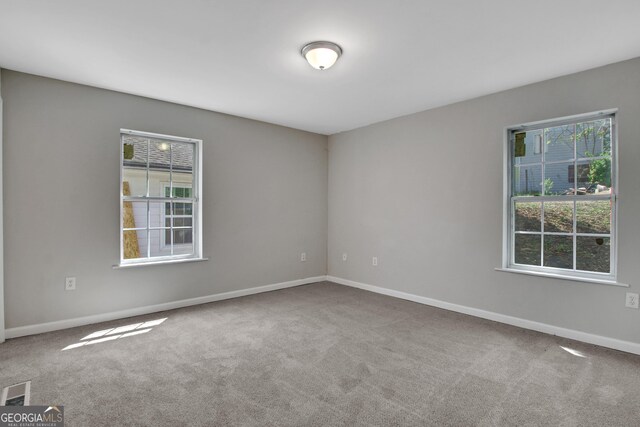 944 Joseph E Boone Blvd NW, Atlanta, GA 30314 - carpeted spare room with visible vents and baseboards