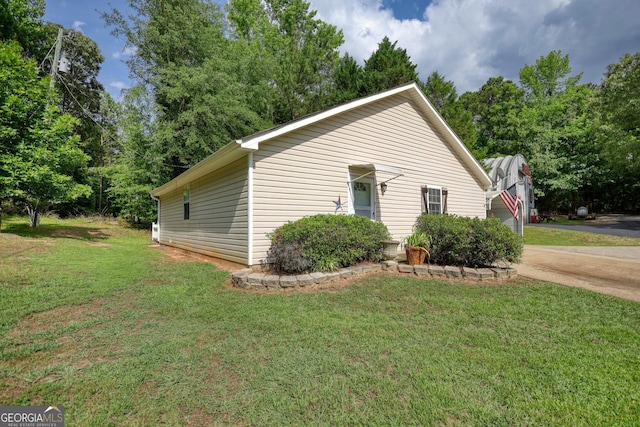 exterior space featuring a front lawn