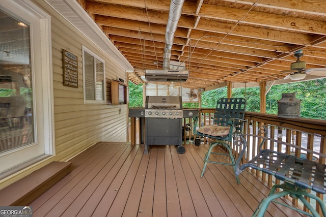 deck featuring a grill