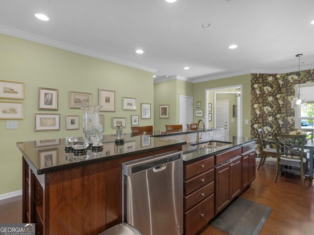 717 Bay Skipper Ct, Griffin, GA 30223 - kitchen with dishwasher, a kitchen island with sink, recessed lighting, ornamental molding, and dark wood-style flooring