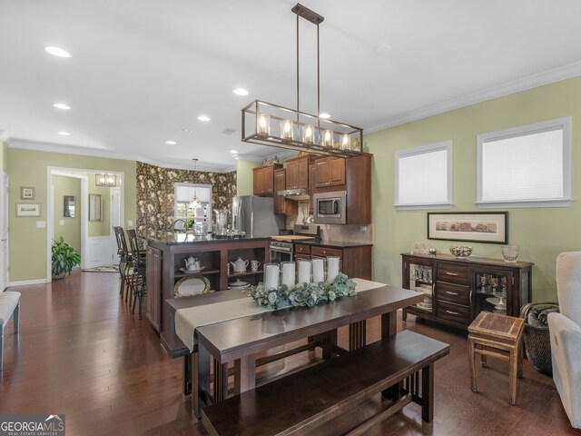 717 Bay Skipper Ct, Griffin, GA 30223 - dining room with ornamental molding, dark wood-type flooring, and recessed lighting