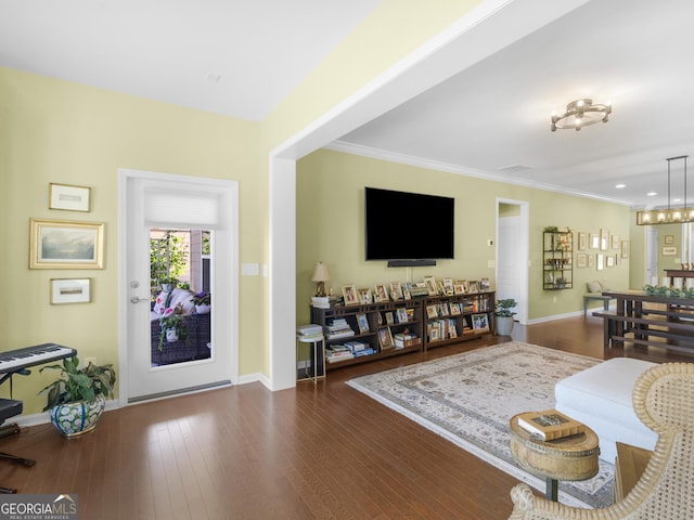 717 Bay Skipper Ct, Griffin, GA 30223 - living room featuring wood-type flooring and ornamental molding