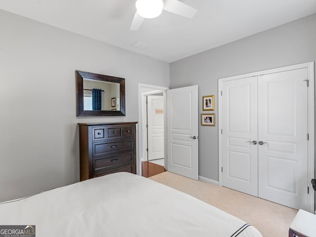 717 Bay Skipper Ct, Griffin, GA 30223 - carpeted bedroom featuring a closet and a ceiling fan