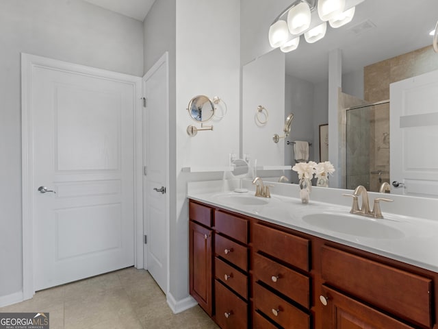 717 Bay Skipper Ct, Griffin, GA 30223 - bathroom with double vanity, a shower stall, and tile patterned flooring
