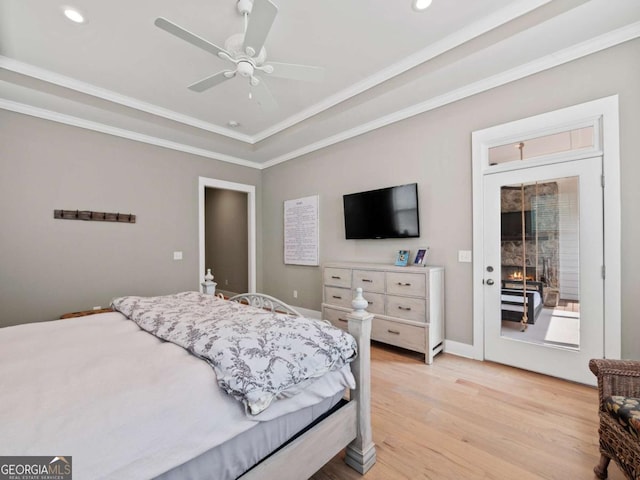 bedroom with light wood-style flooring, baseboards, ornamental molding, ceiling fan, and access to exterior