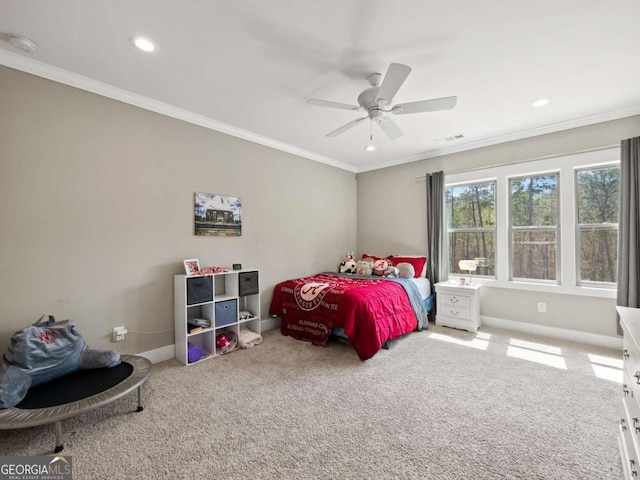 carpeted bedroom featuring baseboards, visible vents, crown molding, and recessed lighting