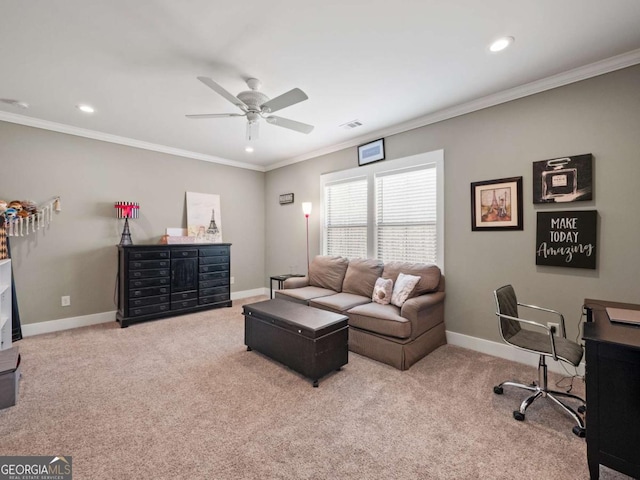 carpeted living area with baseboards, ornamental molding, visible vents, and a ceiling fan