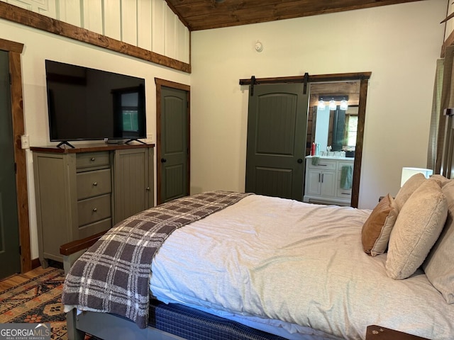 2380 Murphy Hwy, Mineral Bluff, GA 30559 - bedroom featuring wood ceiling, wood finished floors, and a barn door