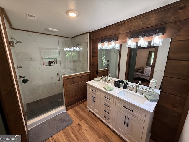 2380 Murphy Hwy, Mineral Bluff, GA 30559 - ensuite bathroom with wood finished floors, a shower stall, and double vanity