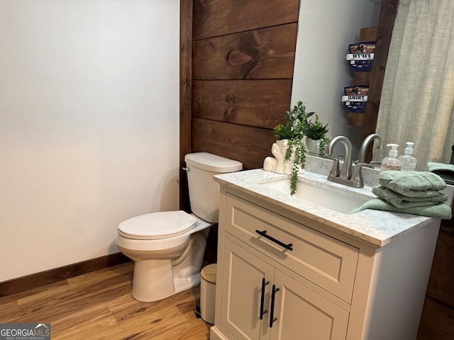 2380 Murphy Hwy, Mineral Bluff, GA 30559 - bathroom with vanity, toilet, wood finished floors, and baseboards