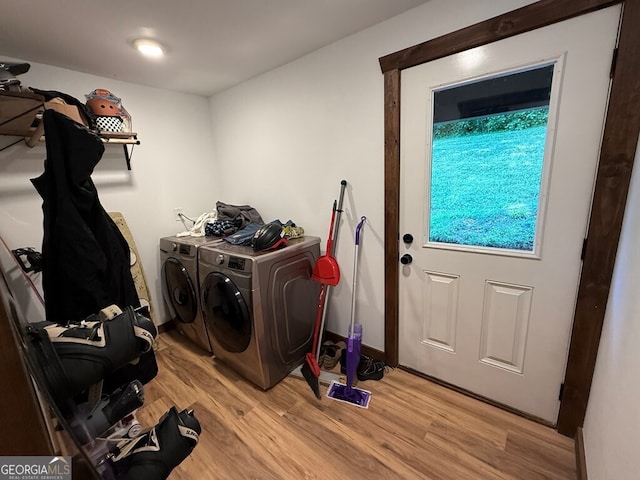 2380 Murphy Hwy, Mineral Bluff, GA 30559 - laundry area featuring washing machine and clothes dryer and light wood-style flooring